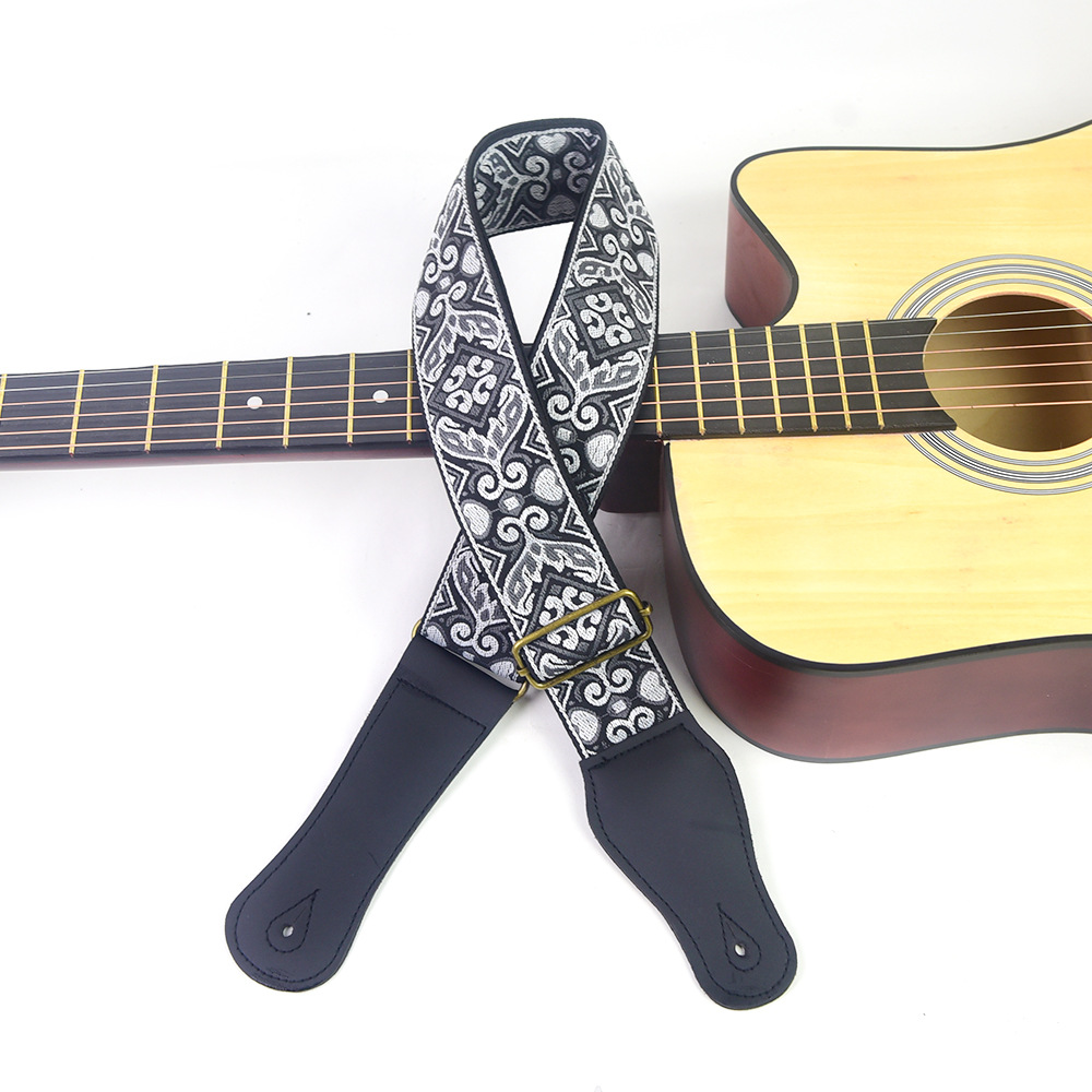 Gitaarband met geborduurde pri - Musical Instrument Types recensie en prijs