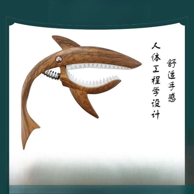 Shark Design Gitaar Capo voor  - Musical Instrument Types recensie en prijs